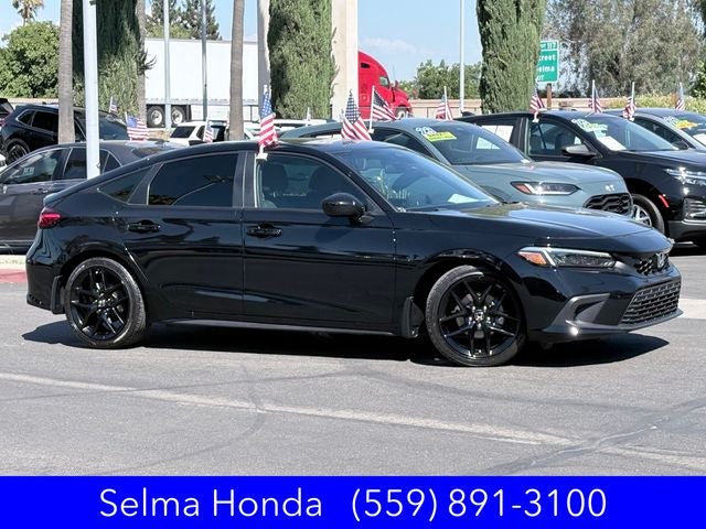 2024 Honda Civic — rear three-quarter view