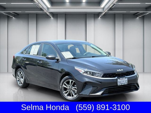 2023 Kia Forte LXS in Aurora Black — front three-quarter view