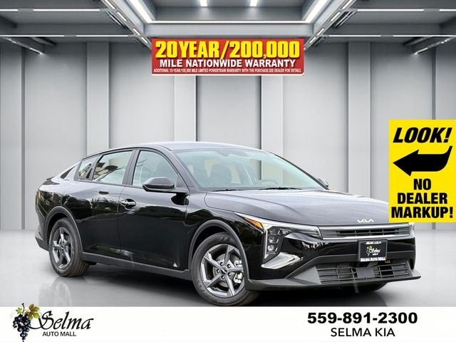 2026 Kia K4 LXS in Aurora Black Pearl — front three-quarter view