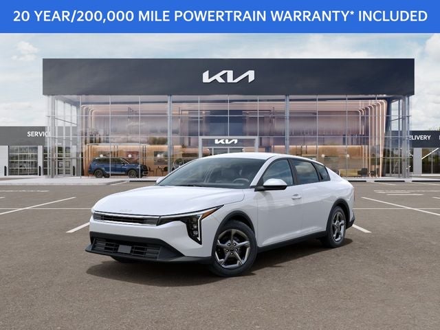 2026 Kia K4 LXS in Snow White Pearl — front three-quarter view