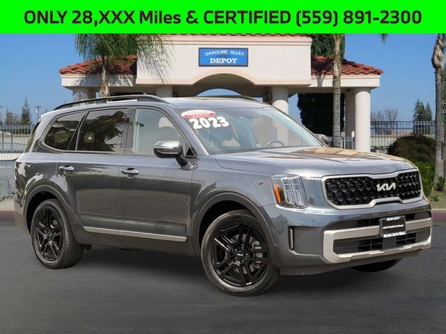 2023 Kia Telluride EX X-Line in Gravity Gray — front three-quarter view