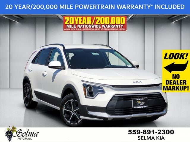 2026 Kia Niro LX in Snow White Pearl — front three-quarter view
