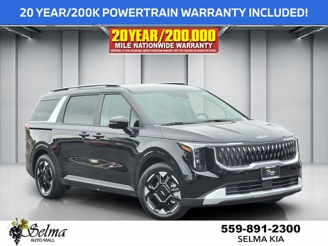 2026 Kia Carnival EX in Aurora Black Pearl — front three-quarter view