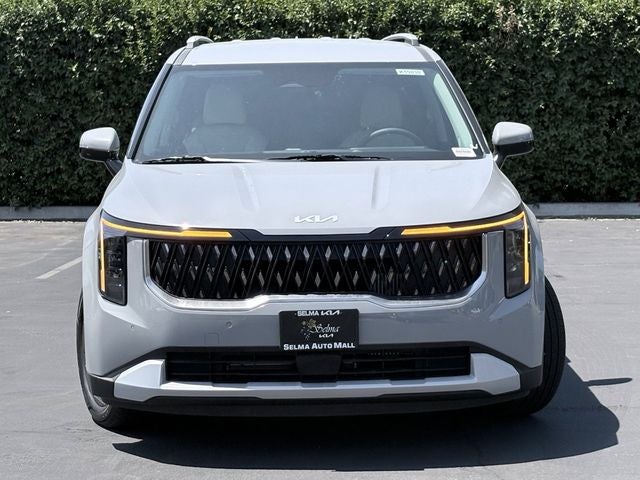 2026 Kia Carnival Hybrid — side profile view